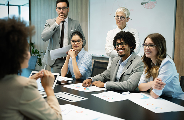 Colleagues in a conference room meeting