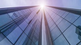 Two buildings with glass exterior