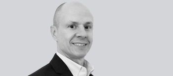 A headshot of Damian Palovick