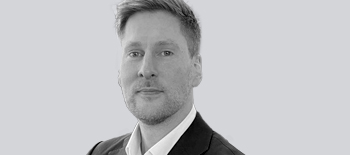 A headshot of Simon Rees
