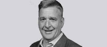 A headshot of Scott Yeomans