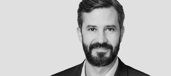 A headshot of Andrew Tartaglia