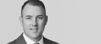 A headshot of Alex Barker