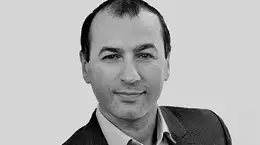 A headshot of Sergey Niunco