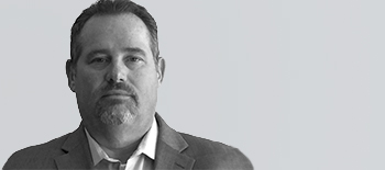 A headshot of Scott Ewing