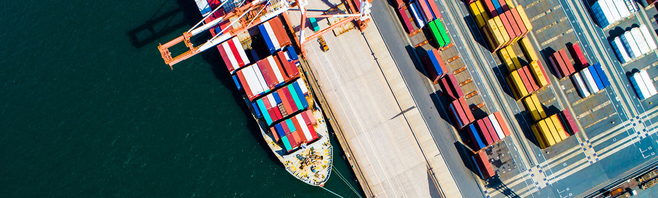 Ships on the dockyard with one ship outside the dockyard