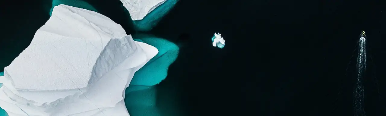 Ice glaciers melting on a water body Ice glaciers melting on a water body