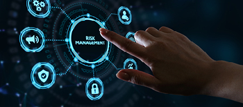 A touch computer screen with Risk Management in the center in blue and icons around