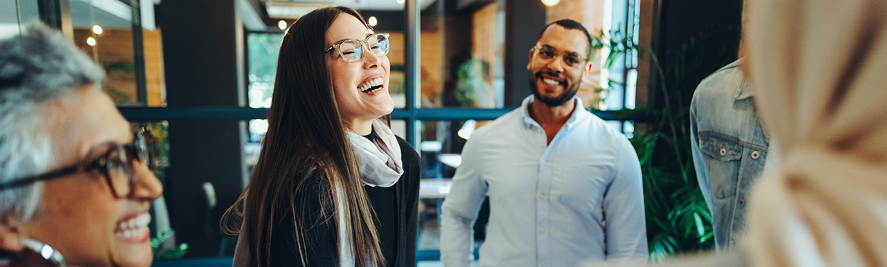 A group of people laughing together